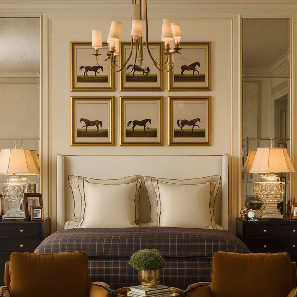 Framed prints in a hotel bedroom.