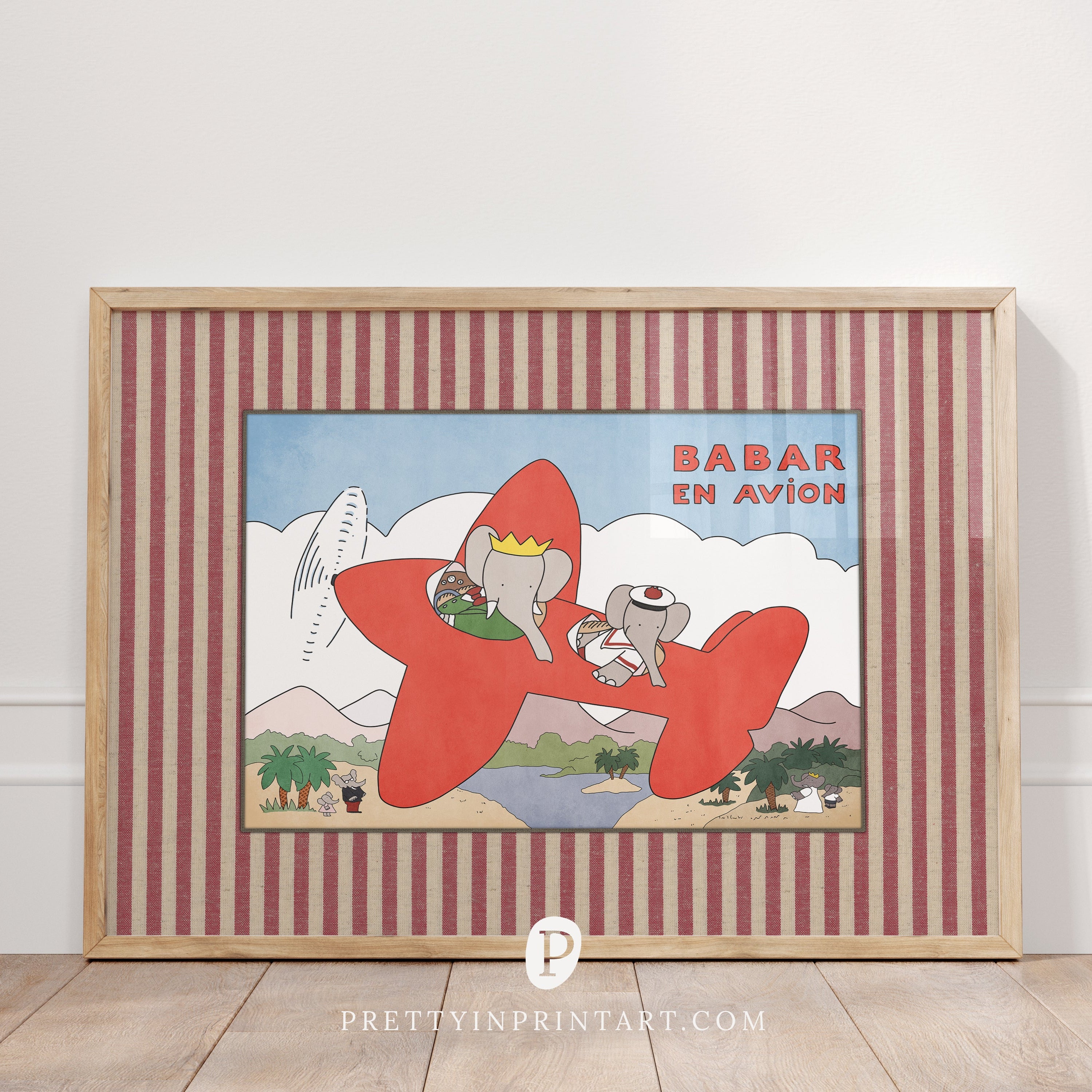 Framed artwork of 'Babar en Avion' with a red and white striped border.