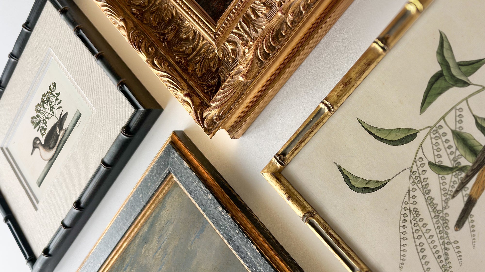 A selection of vintage framed prints.